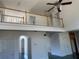 Upstairs hallway overlooking downstairs common areas at 240 Flowers Cove Ln, Lilburn, GA 30047