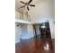 Spacious living room with tall ceilings, hardwood floors and an open floor plan at 240 Flowers Cove Ln, Lilburn, GA 30047