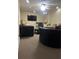 Large living room with plush seating and a television at 240 Flowers Cove Ln, Lilburn, GA 30047