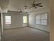 A Main bedroom with multiple windows, ceiling fans, and natural light at 240 Flowers Cove Ln, Lilburn, GA 30047