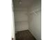 A walk-in closet with wire shelving at 240 Flowers Cove Ln, Lilburn, GA 30047