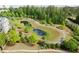 Backyard patios with green lawns, and mature trees for added privacy at 1074 Heyward Way, Alpharetta, GA 30009