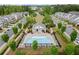 Aerial view of the neighborhood pool with sun loungers and a community gathering space at 1074 Heyward Way, Alpharetta, GA 30009