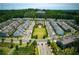 Beautiful aerial view of a residential community with lush green spaces and well-maintained homes at 1074 Heyward Way, Alpharetta, GA 30009