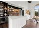 Harlow Hall clubhouse bar area featuring modern lighting and sleek white countertops at 1074 Heyward Way, Alpharetta, GA 30009