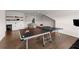 Finished basement with a ping pong table, wet bar, and comfortable seating, ideal for recreation at 1074 Heyward Way, Alpharetta, GA 30009
