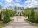 Exterior view of the community clubhouse, steps, and landscaped grounds at 1074 Heyward Way, Alpharetta, GA 30009