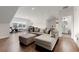 Spacious living room in basement with comfortable seating and exercise bike for active leisure at 1074 Heyward Way, Alpharetta, GA 30009