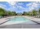 Enjoy this luxurious community pool surrounded by lush landscaping and upscale townhomes at 1074 Heyward Way, Alpharetta, GA 30009