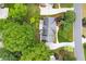 Aerial view of a landscaped home with a grey roof and manicured hedges at 1328 Wyntercreek Rd, Atlanta, GA 30338