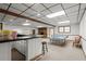 Finished basement featuring a ping pong table, bar, and seating area perfect for entertaining at 1328 Wyntercreek Rd, Atlanta, GA 30338