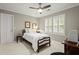 Charming bedroom with a single bed, ceiling fan, and bright natural light at 1328 Wyntercreek Rd, Atlanta, GA 30338