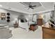 Spacious main bedroom with tray ceilings, ceiling fan and sitting area at 1328 Wyntercreek Rd, Atlanta, GA 30338