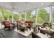 Inviting porch area featuring comfortable outdoor seating and views of the landscape at 1328 Wyntercreek Rd, Atlanta, GA 30338