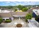 The Village Courtyard aerial view featuring a pergola with lighting, lush green vegetation, and mature trees in background at 1328 Wyntercreek Rd, Atlanta, GA 30338