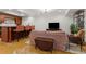 Finished basement featuring a wet bar, tile flooring, and comfortable seating area at 1658 Mount Paran Nw Rd, Atlanta, GA 30327