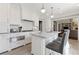 Beautiful white kitchen with stainless steel appliances and a center island with counter seating at 1658 Mount Paran Nw Rd, Atlanta, GA 30327