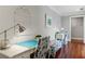 Charming study room with hardwood floors, white desks, and floral seating at 1658 Mount Paran Nw Rd, Atlanta, GA 30327