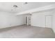 Large basement with neutral carpet, doors, and closet at 1721 Druids Se Xing, Conyers, GA 30013