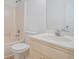Standard bathroom with tiled floor, neutral walls, and a shower-tub combo at 1721 Druids Se Xing, Conyers, GA 30013
