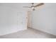 Bright bedroom with neutral carpet and two white doors at 1721 Druids Se Xing, Conyers, GA 30013