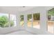 Bright breakfast area with backyard views, complemented by a tile floor and white walls at 1721 Druids Se Xing, Conyers, GA 30013
