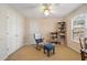 Bedroom featuring neutral walls, carpet, and a window for natural light at 5 Renfroe Ct, Decatur, GA 30030