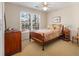 Bedroom featuring a bed, dresser, and window for natural light at 5 Renfroe Ct, Decatur, GA 30030