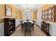 Dining room featuring elegant decor, a chandelier, and wainscoting at 5 Renfroe Ct, Decatur, GA 30030