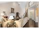 Living room with vaulted ceilings, a fireplace, hardwood floors, and bright natural light at 5 Renfroe Ct, Decatur, GA 30030