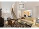 Spacious living room with stairs, an open floor plan, and hardwood floors at 5 Renfroe Ct, Decatur, GA 30030