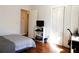 Bedroom with hardwood floors and white walls and closet at 727 Regina Ct, Lawrenceville, GA 30043