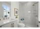 Bright bathroom featuring shower with glass door and a marble countertop at 1765 Beckham Ne Pl # 53, Atlanta, GA 30324