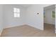 This room features hardwood floors, bright natural light, and a doorway to an additional room at 1765 Beckham Ne Pl # 53, Atlanta, GA 30324