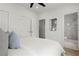 Bright bedroom featuring ensuite bathroom and walk-in closets at 1765 Beckham Ne Pl # 53, Atlanta, GA 30324