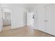 The bedroom features a doorway to the bathroom and a double door closet for optimal storage at 1765 Beckham Ne Pl # 53, Atlanta, GA 30324