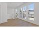Bonus room filled with natural light, featuring a private balcony and hardwood floors at 1765 Beckham Ne Pl # 53, Atlanta, GA 30324