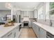Modern kitchen with stainless steel appliances, sleek countertops, and plenty of cabinet space at 1765 Beckham Ne Pl # 53, Atlanta, GA 30324