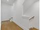 Bright staircase with light wood floors and clean white trim at 1765 Beckham Ne Pl # 53, Atlanta, GA 30324
