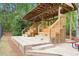 Community amphitheater featuring stepped wooden seating and a covered stage at 1894 Whitehawk Ct, Lawrenceville, GA 30043