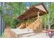 Community amphitheater featuring stepped wooden seating and a covered stage at 1894 Whitehawk Ct, Lawrenceville, GA 30043