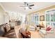 Open-concept living area with hardwood floors and seamless flow to the kitchen at 1894 Whitehawk Ct, Lawrenceville, GA 30043