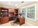 Basement office space with custom built-ins and large window view at 1894 Whitehawk Ct, Lawrenceville, GA 30043