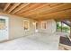 Covered patio featuring multiple access doors and access to the backyard at 1894 Whitehawk Ct, Lawrenceville, GA 30043