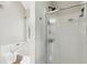 A bathroom with a separate shower that features a glass enclosure, adding a touch of modern comfort at 2301 Sharon Se Ct, Conyers, GA 30013