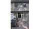 The back exterior of the property features a sliding glass door, fencing and an AC unit at 2896 Vining Ridge Ter, Decatur, GA 30034
