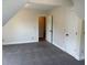 Bedroom with sloped ceilings and gray carpet at 4234 Winston Cir, Atlanta, GA 30349