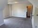 Bedroom with sloped ceilings and gray carpet at 4234 Winston Cir, Atlanta, GA 30349
