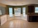 Bright dining area with tile floors, a chandelier, and lots of natural light at 4234 Winston Cir, Atlanta, GA 30349