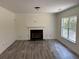 Bright living room featuring hardwood floors and a fireplace, offering a cozy and inviting space at 4234 Winston Cir, Atlanta, GA 30349